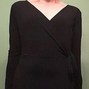 Long sleeve knee length faux wrap dress